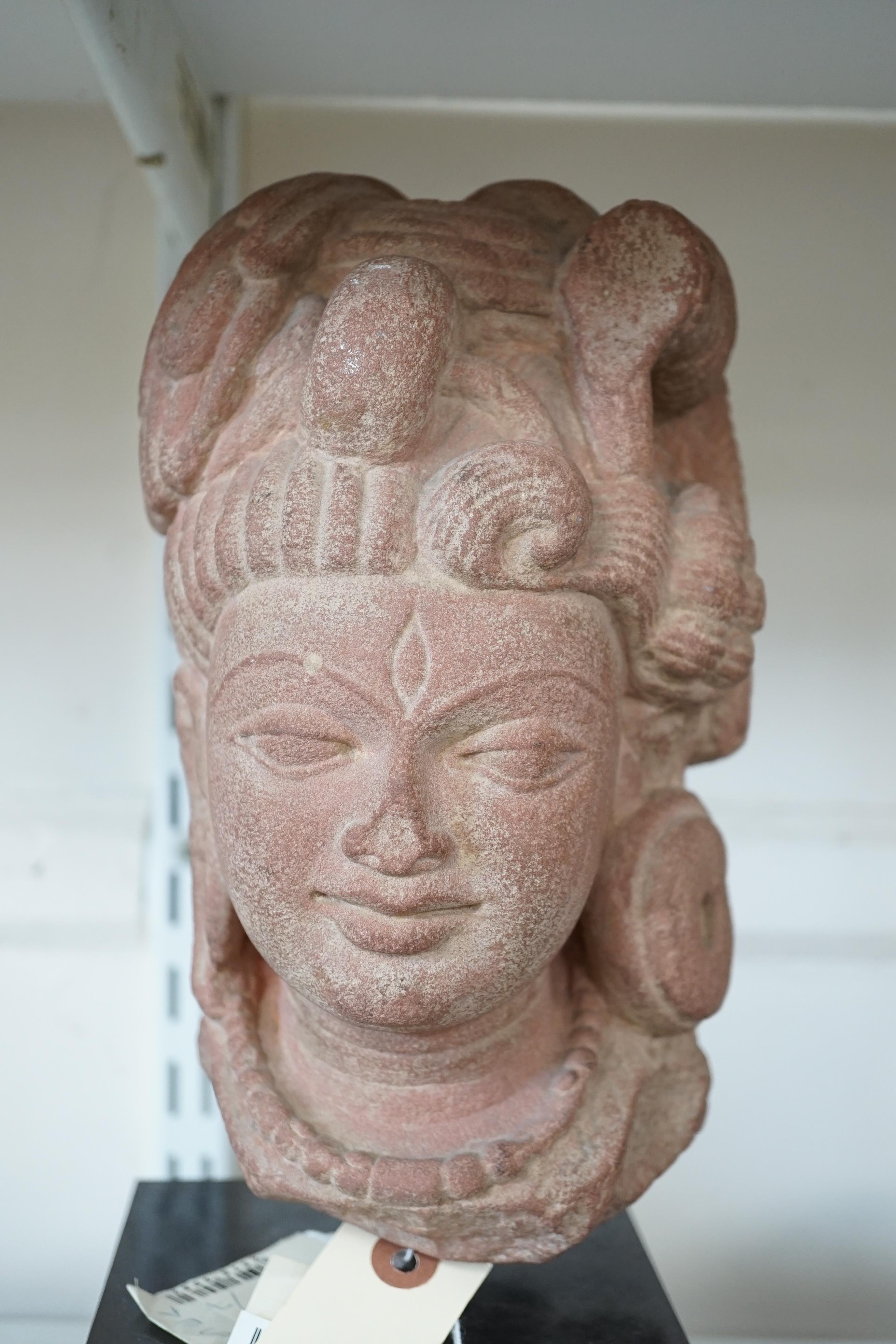 A red stone head of Ardhanarishvara, Muthura region, India, Gupta period, c.5th century A.D.